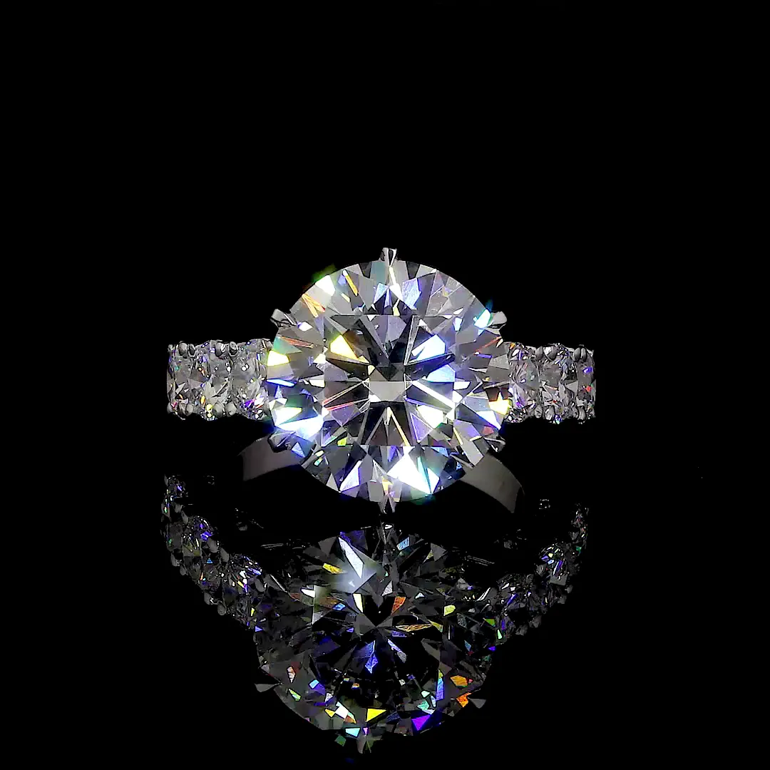 Round Brilliant Diamond Solitaire Ring with Pavé Band feature_image 1788868531_vlcsnap-2025-07-28-16h44m40s601.webp